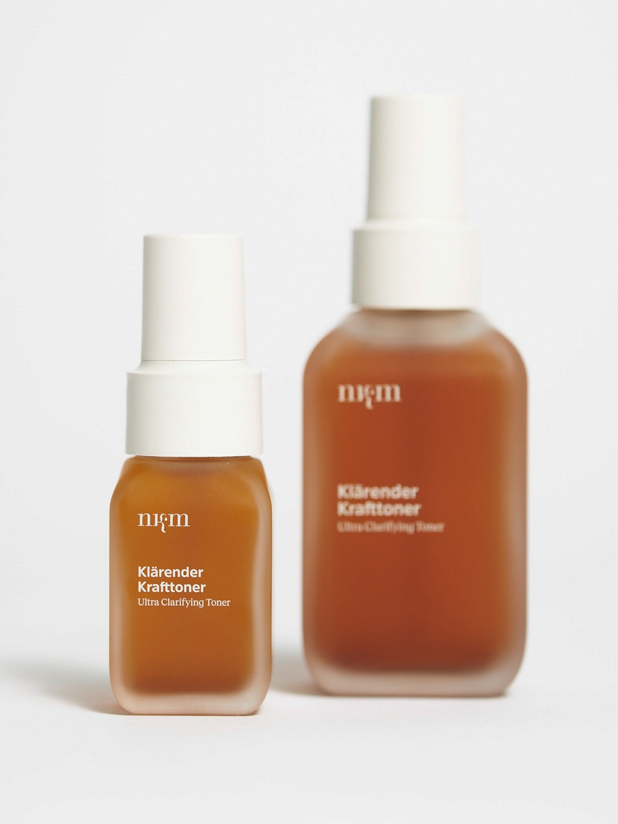 Klärender Krafttoner in regulärer und Reisegröße