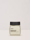 Ein Tiegel der nkm Naturkosmetik München GmbH Ultrafeuchte 24h Barriere Creme mit schwarzem Deckel steht vor einem schlichten, hellen Hintergrund.