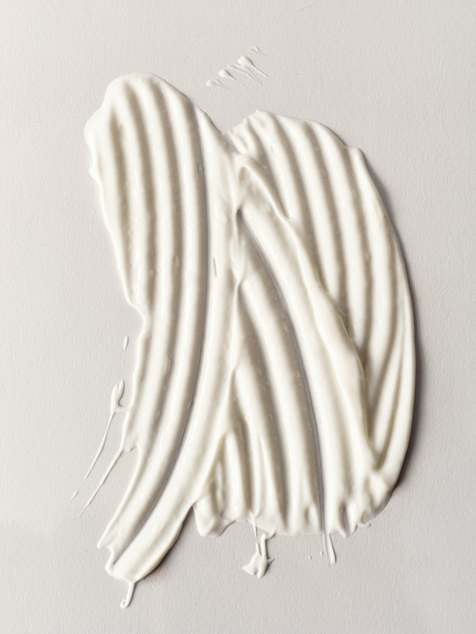 Aufgetragene weiße Creme