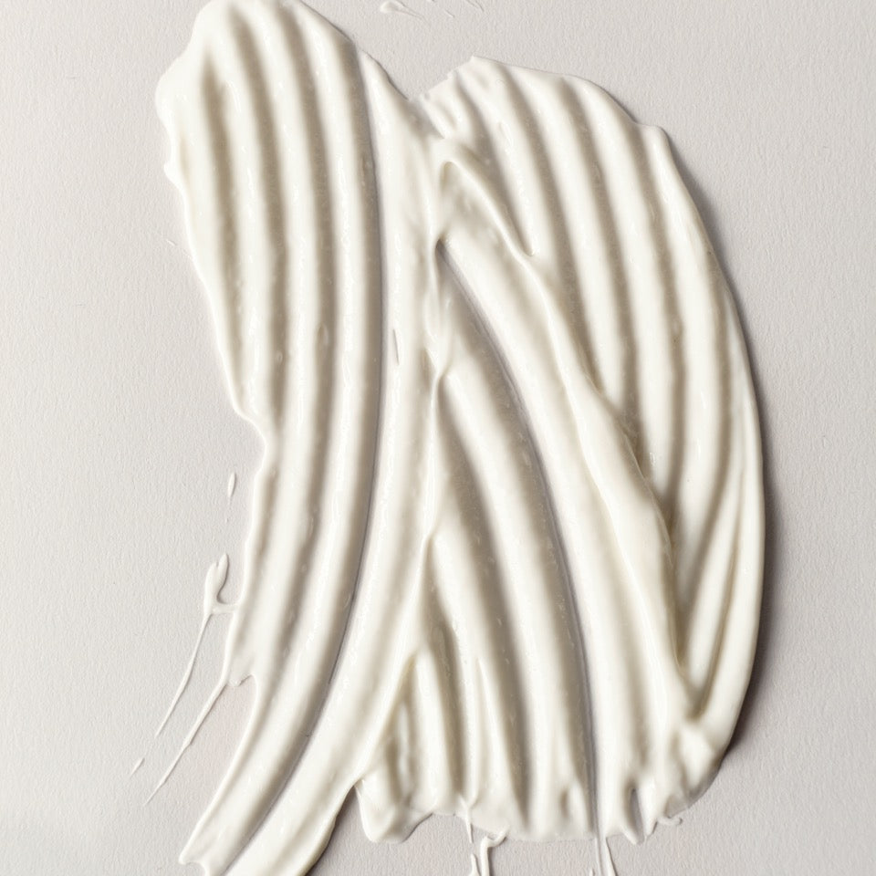Aufgetragene weiße Creme