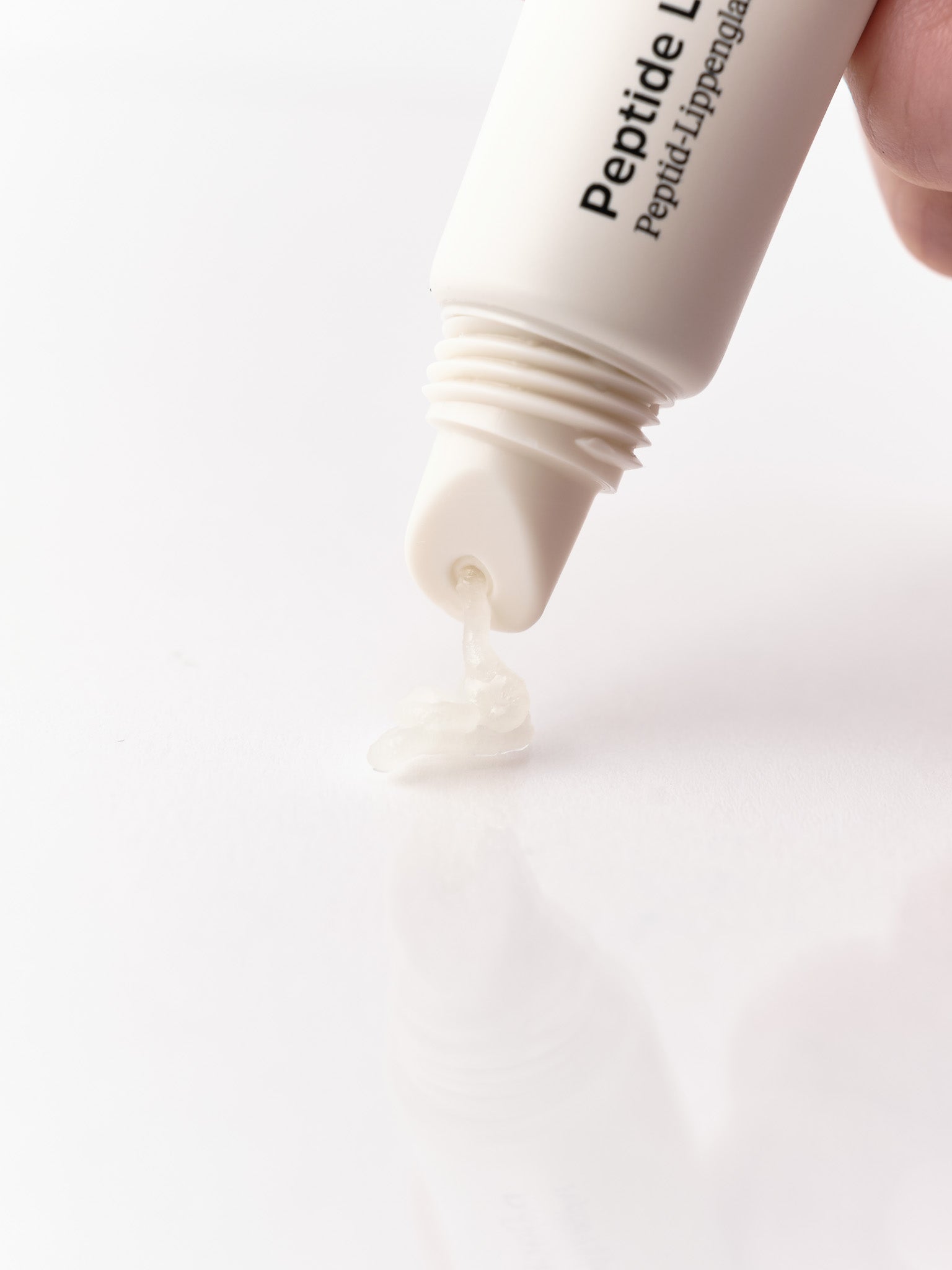 Peptide Lip Glaze presst Konsistenz heraus