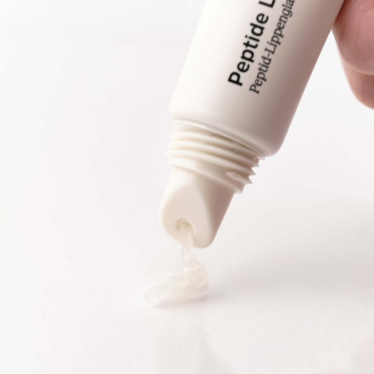 Peptide Lip Glaze presst Konsistenz heraus