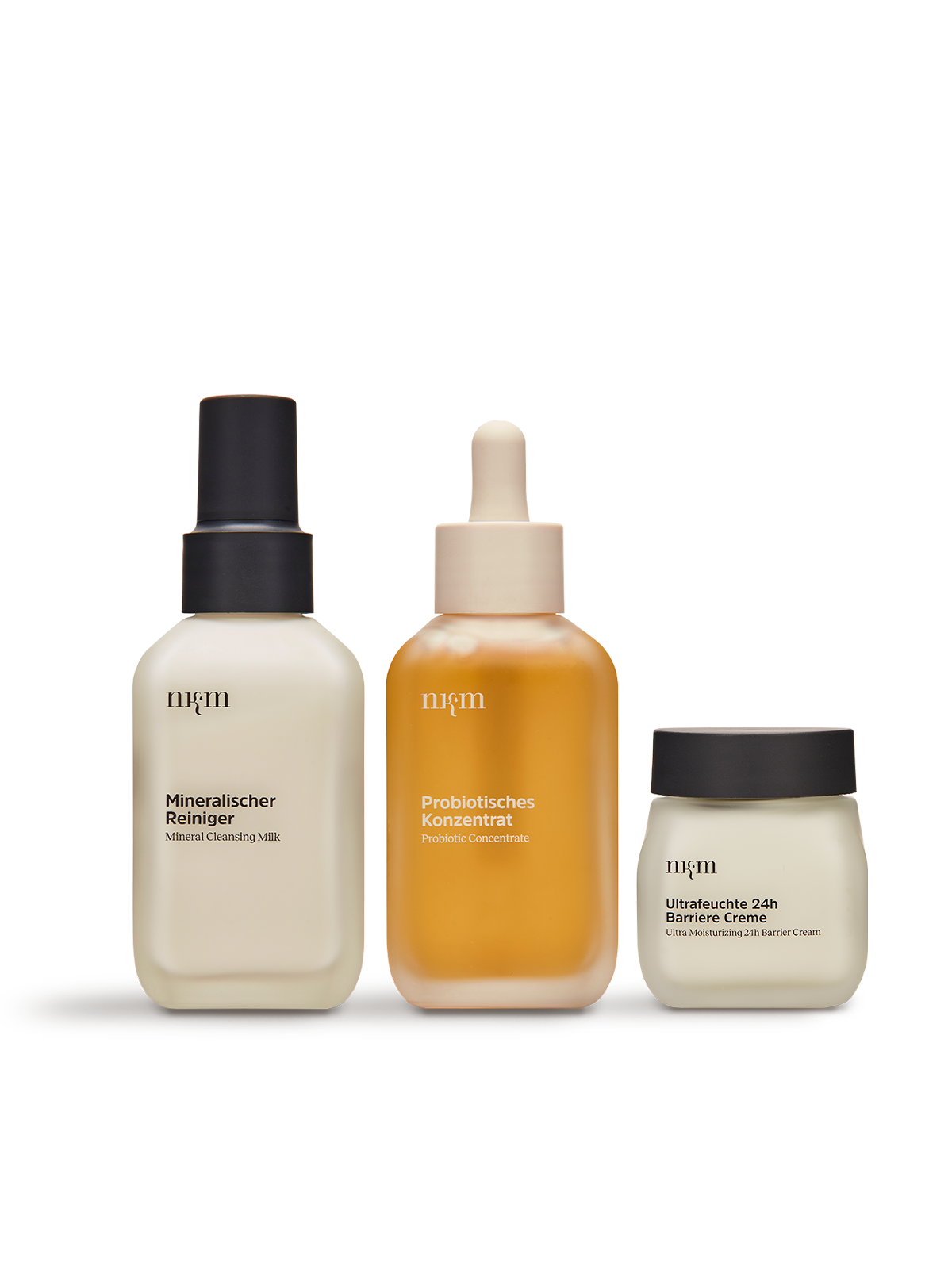 Angeordnete Produkte von nkm: Mineralischer Reiniger, Probiotisches Konzentrat, Ultrafeuchte 24h Barriere Creme