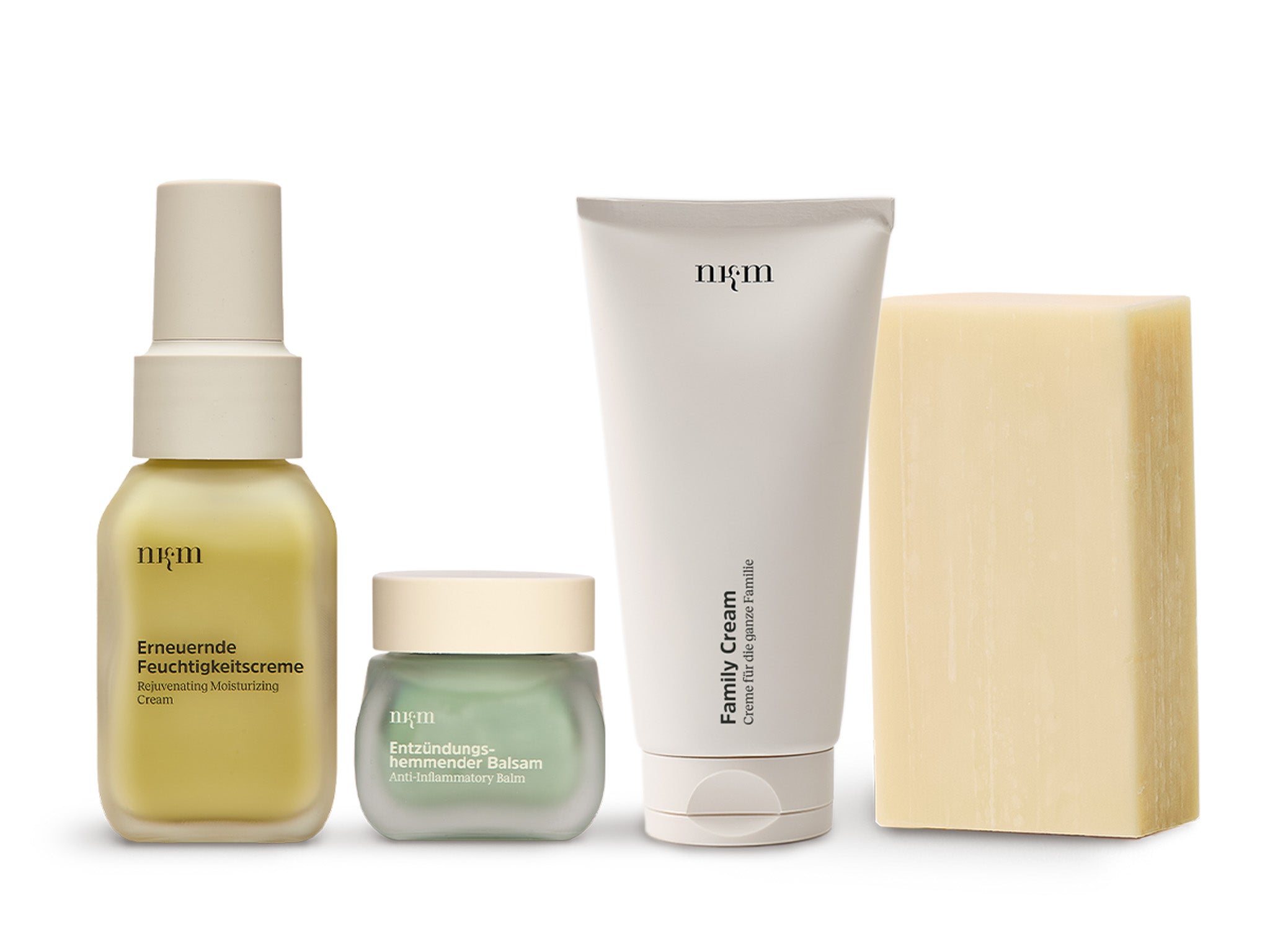 Set von nkm mit Erneuernder Feuchtigkeitscreme, Entzündungshemmendem Balsam, Family Cream und Beruhigendem Reinigungsblock