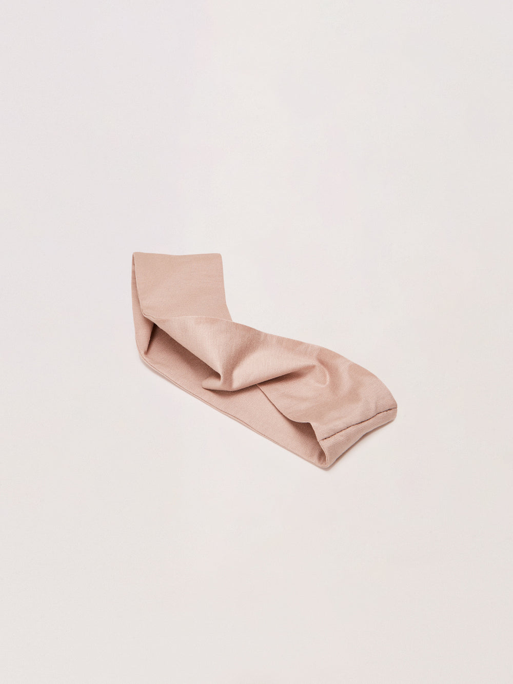 Ein Jersey Haarband in beige von NKM Naturkosmetik München.